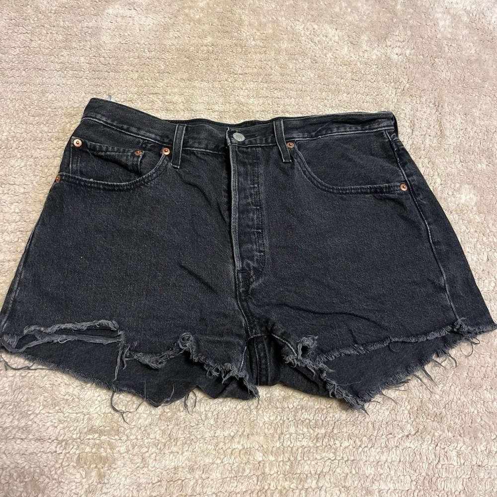 Levi's 501 washed black cut off shorts in women's size 31